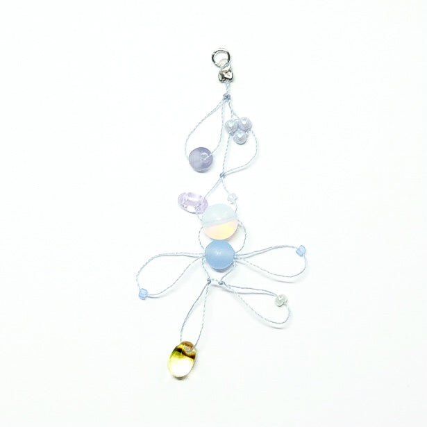 Moon Twirl Charm